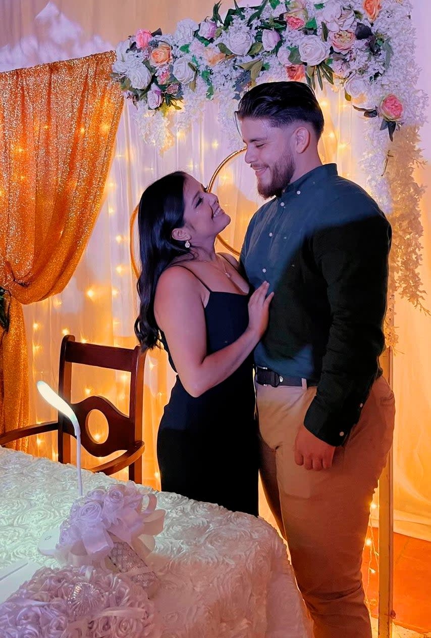 In this undated photo provided by Karen Caballero, her son Alejandro Miguel Andino Caballero and his girlfriend Margie Tamara Paz Grajera pose for a photo at an undisclosed location in Honduras. (AP)