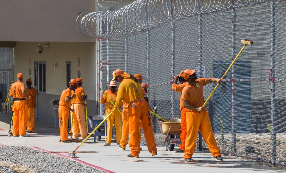 Inmates work inside the Arizona State Prison-Kingman in June 2016.