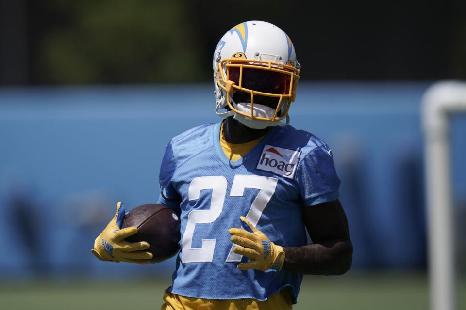 Chargers cornerback J.C. Jackson carries the ball during a team practice in June.