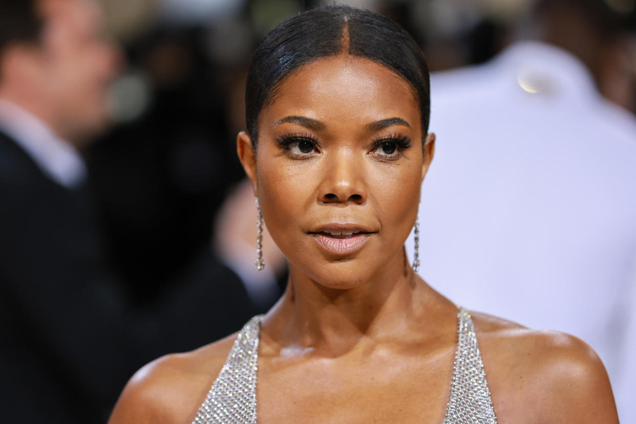 Gabrielle Union took to Instagram on Saturday to share show-stopping street photos of herself wearing a sporty white Prada dress. (Photo by Theo Wargo/WireImage)