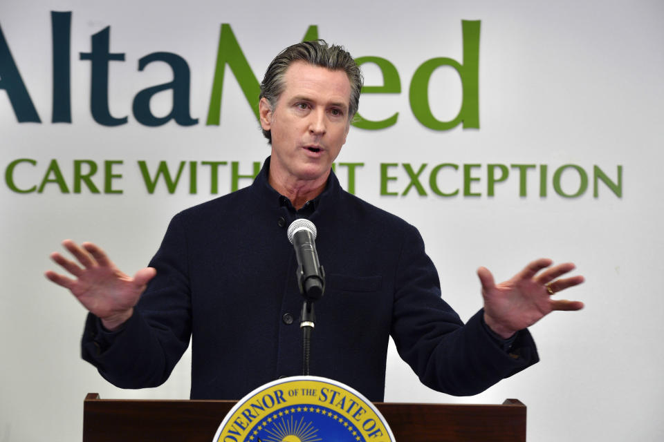 California Gov. Gavin Newsom speaks during a press conference at a COVID-19 vaccination site at AltaMed in Santa Ana, Calif., on Thursday, March 25, 2020. California is expanding its vaccine eligibility to anyone 50 and over starting in April and anyone 16 and over on April 15, Gov. Newsom said Thursday. (Jeff Gritchen/The Orange County Register via AP)