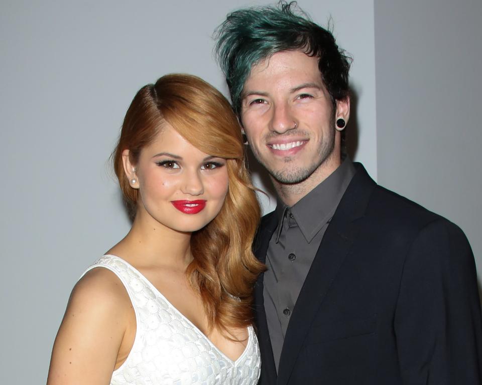 <p>After getting engaged in December of 2018, actor <a href="https://www.glamour.com/story/debby-ryan-spokesperson?mbid=synd_yahoo_rss" rel="nofollow noopener" target="_blank" data-ylk="slk:Debby Ryan;elm:context_link;itc:0;sec:content-canvas" class="link ">Debby Ryan</a> and her partner, Joshua Dun of Twenty One Pilots, <a href="https://www.vogue.com/slideshow/debby-ryan-joshua-dun-twenty-one-pilots-wedding?mbid=synd_yahoo_rss&utm_medium=social&utm_source=twitter&utm_social-type=owned&utm_brand=vogue" rel="nofollow noopener" target="_blank" data-ylk="slk:secretly got married;elm:context_link;itc:0;sec:content-canvas" class="link ">secretly got married</a> one year later—and they had planned their wedding in just 28 days. “We began to flirt with the idea of having a destination party celebrating the new decade, then decided in December to get married [in Austin] on New Year’s Eve, and just keep dancing until after the ball dropped,” the <em>Insatiable</em> actor told <em>Vogue</em>. “The time just felt right.” </p> <p>You can see Ryan’s Elie Saab gown and more photos from the big day <a href="https://www.vogue.com/slideshow/debby-ryan-joshua-dun-twenty-one-pilots-wedding?mbid=synd_yahoo_rss&utm_medium=social&utm_source=twitter&utm_social-type=owned&utm_brand=vogue" rel="nofollow noopener" target="_blank" data-ylk="slk:here;elm:context_link;itc:0;sec:content-canvas" class="link ">here</a>.</p>