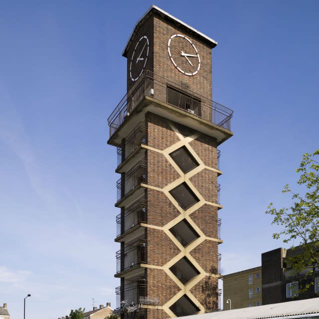 The Chrisp Street Market Clock Tower and The Festival Inn in Poplar, London (James O. Davies/Historic England/PA)