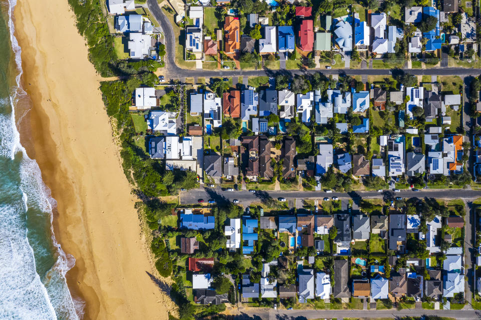 Aerial view of suburban property near the beach.