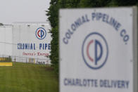 The entrance of Colonial Pipeline Company is shown Wednesday, May 12, 2021, in Charlotte, N.C. Several gas stations in the Southeast reported running out of fuel, primarily because of what analysts say is unwarranted panic-buying among drivers, as the shutdown of a major pipeline by hackers entered its fifth day. (AP Photo/Chris Carlson)