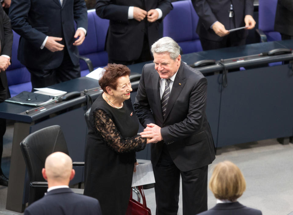 Holocaust survivor Inge Deutschkron and German President Joachim Gauck attend a commemorative event for the victims of the Nazi era at the German Bundestag parliament in Berlin, Germany, Jan. 30, 2013. (AP Photo/dpa, Kay Nietfeld)