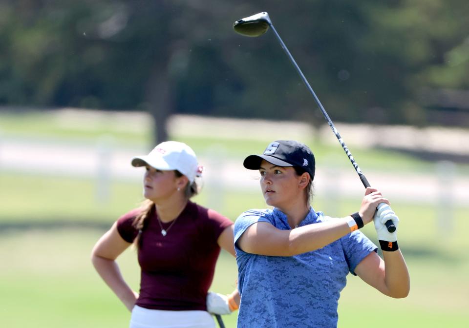 Stillwater's Lucy Darr watches her drive on the eighth hole during the Class 6A girls golf state championship Tuesday at Stillwater Country Club.