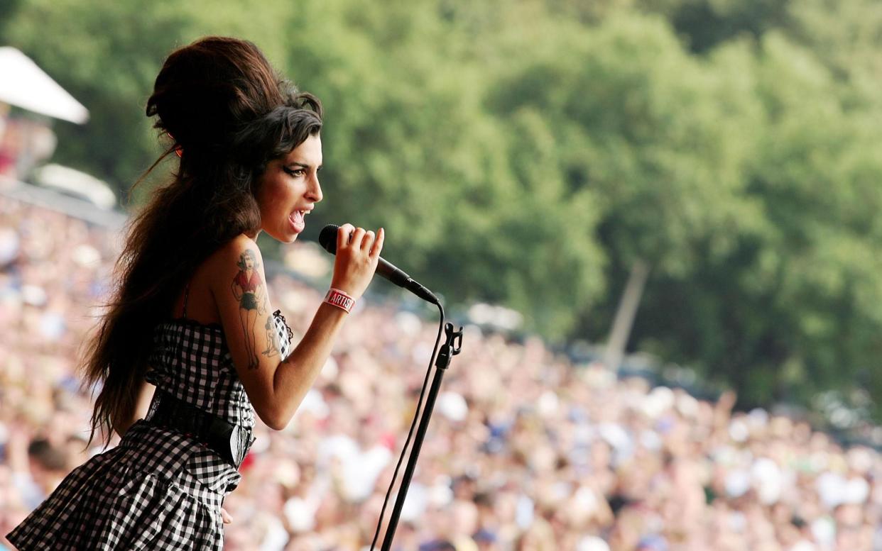 Amy Winehouse performing in Chicago in 2007 - Getty Images