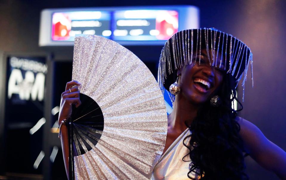 Beyoncé fan Deja Patton wears a dazzling outfit to a screening of "Renaissance: A Film By Beyoncé" in IMAX on Friday, Dec. 1, 2023, at the Malco Paradiso theater in Memphis, Tenn.