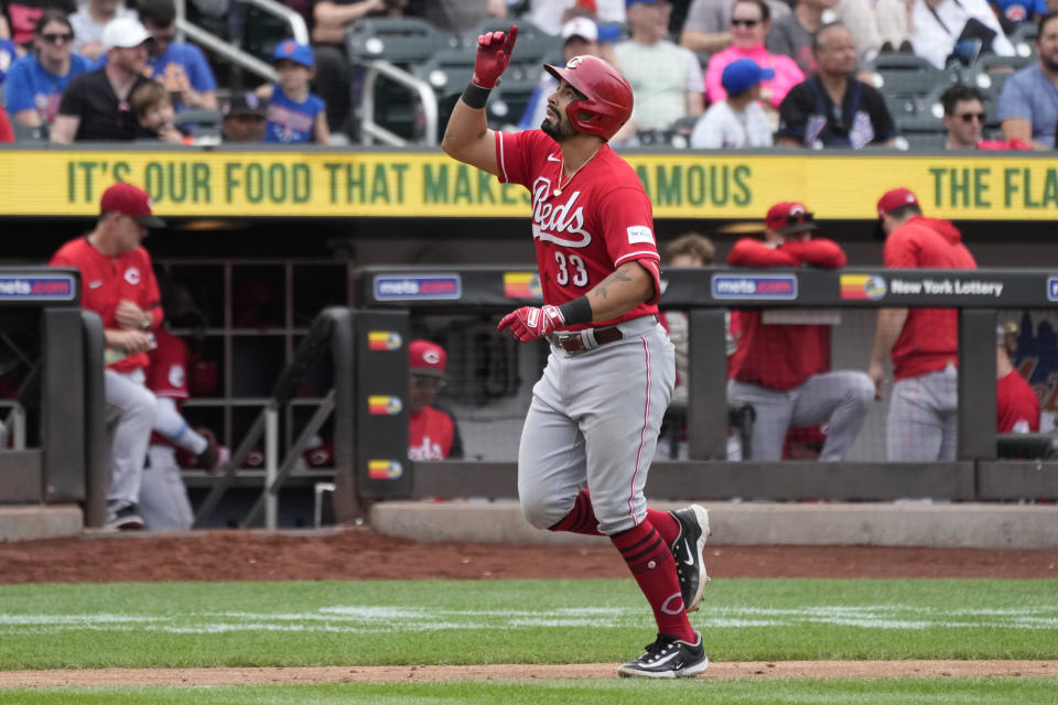 Cincinnati Reds' Christian Encarnacion-Strand rounds the bases after hitting a two-run home run during the eighth inning of a baseball game against the New York Mets, Sunday, Sept. 17, 2023, in New York. (AP Photo/Mary Altaffer)