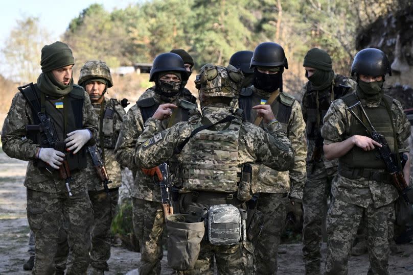 Members of a newly-formed "Siberian Battalion" within the Ukrainian Armed Forces take part in a military training exercise outside Kyiv on October 24, 2023