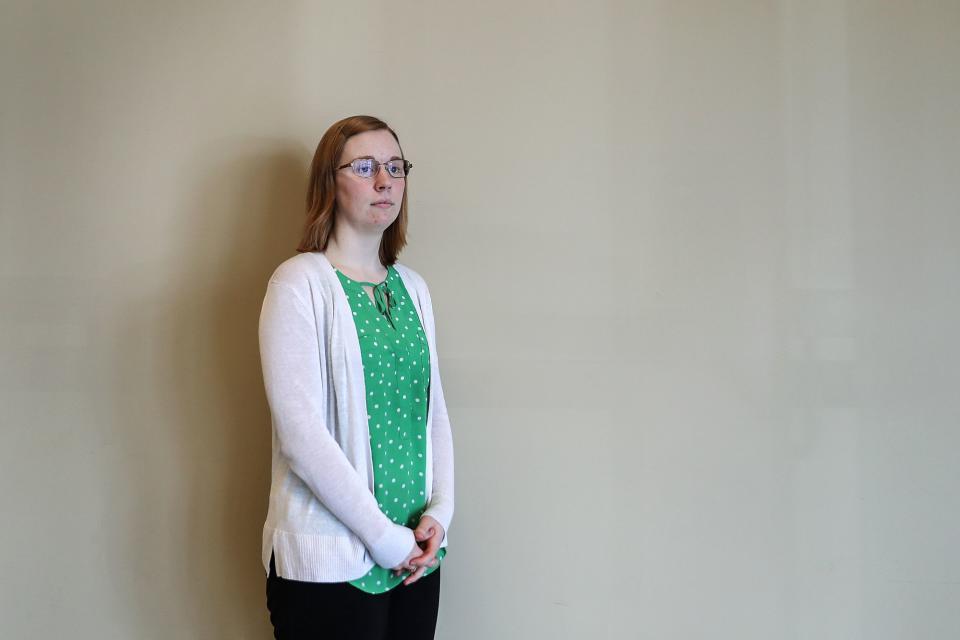 Taylor University alumna Emily Russell poses for a picture in Marion, Ind., where she now lives and works, Monday, April 22, 2019. Russell expressed frustration with Taylor's choice to have Vice President Mike Pence deliver the school's commencement address in May. "I think one of the biggest errors in the political and religious conversation today is this idea that Christianity is one group of people with the same opinions or the same politics or the same life experiences, and I think Taylor is just a microcosm of that," Russell said. "There are people from so many different backgrounds, politically and religiously."