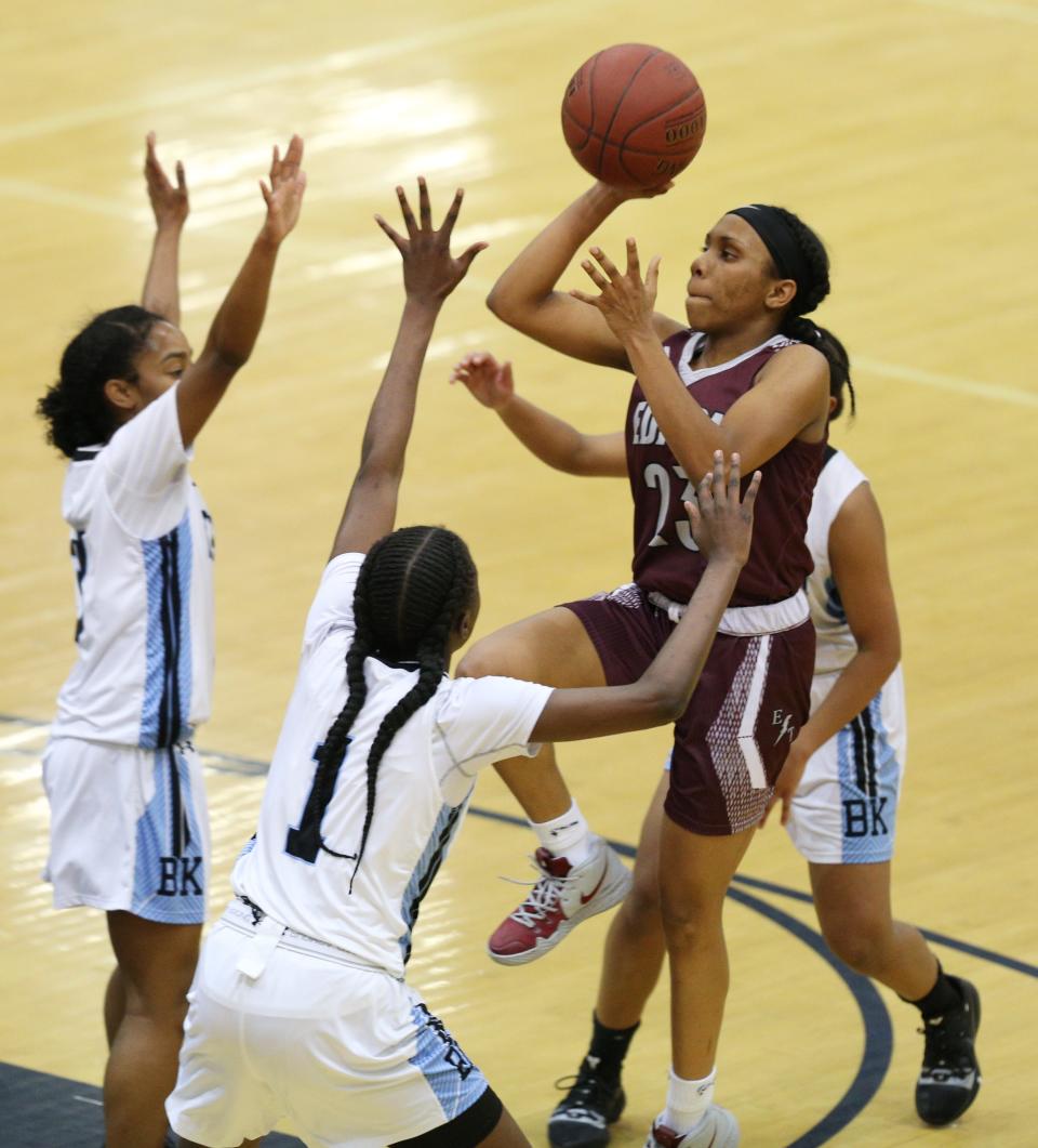 Edison Tech Dyaisha Fair (23) attempts to shoot over 6-foot-tall Bishop Kearney center Saniaa Wilson, left, and 5-11 Lytoya Baker during the Section V Class AA semifinals.