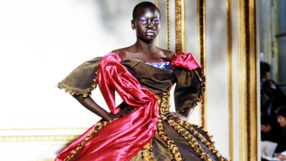 Alek Wek models a bulbous, satin ball gown at Vivienne Westwood's Spring-Spring 1998 show. - Giovanni Giannoni/Penske Media/Getty Images