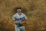 Los Angeles Dodgers relief pitcher Blake Treinen celebrates their win against the Tampa Bay Rays in Game 5 of the baseball World Series Sunday, Oct. 25, 2020, in Arlington, Texas. Dodgers beat the Rays 4-2 to lead the series 3-2 games. (AP Photo/David J. Phillip)