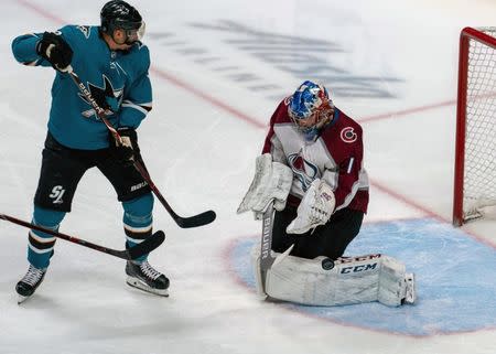 Apr 6, 2019; San Jose, CA, USA; Colorado Avalanche goaltender Semyon Varlamov (1) makes a save against San Jose Sharks left wing Evander Kane (9) during the third period at SAP Center at San Jose. Mandatory Credit: Neville E. Guard-USA TODAY Sports