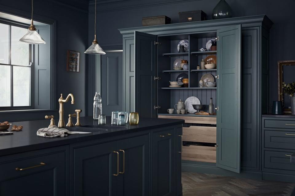 <p>On the hunt for a darker, more swoon-worthy style? We're crushing on this dark teal storage unit, which can be hidden away thanks to the cabinet doors. <br></p><p>• See more from <a href="https://www.burbidgekitchenmakers.co.uk/" rel="nofollow noopener" target="_blank" data-ylk="slk:Burbidge Kitchen Makers;elm:context_link;itc:0;sec:content-canvas" class="link ">Burbidge Kitchen Makers</a></p>