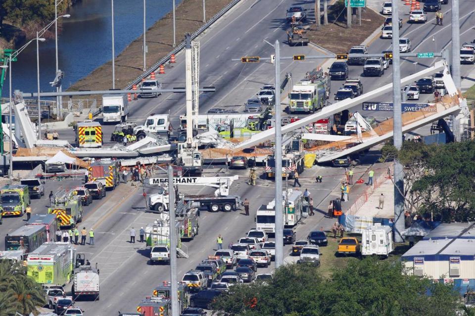 Collapse: The bridge had been installed on Saturday over the busy road (REUTERS)