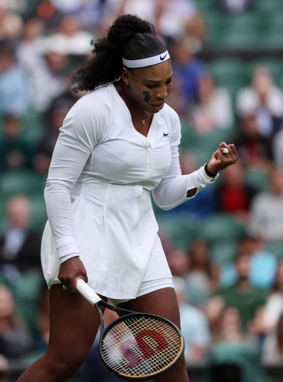 serena williams wimbledon fashion outfits and looks, LONDON, ENGLAND - JUNE 28: Serena Williams of United States celebrates a point against Harmony Tan of France during their Women's Singles First Round Match on day two of The Championships Wimbledon 2022 at All England Lawn Tennis and Croquet Club on June 28, 2022 in London, England. (Photo by Clive Brunskill/Getty Images)