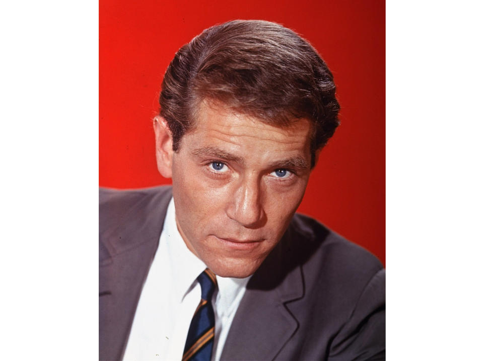 Actor George Segal appears in a portrait from 1965. Segal, the banjo player turned actor who was nominated for an Oscar for 1966's “Who’s Afraid of Virginia Woolf?,” and starred in the ABC sitcom “The Goldbergs,” died Tuesday, his wife said. He was 87. (AP Photo, File)