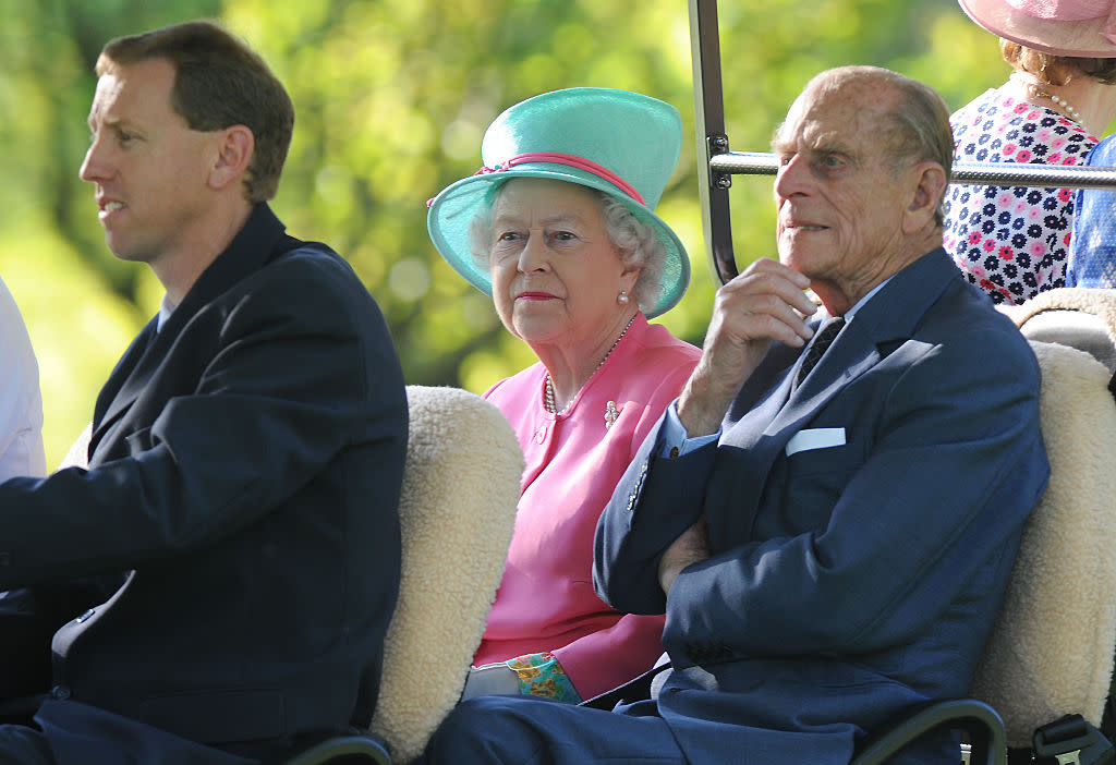 The monarch also used a golf buggy to tour the gardens of Government House with the Duke of Edinburgh in 2011 in Canberra, Australia. (Getty Images)