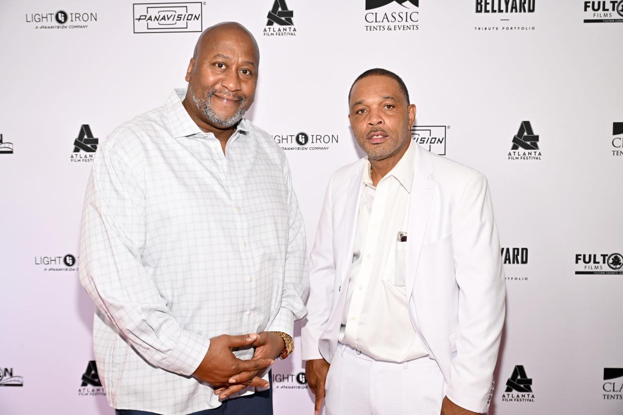 Sean Johnson, left, and Clarence Maclin attend a "Sing Sing" screening in Atlanta in May.