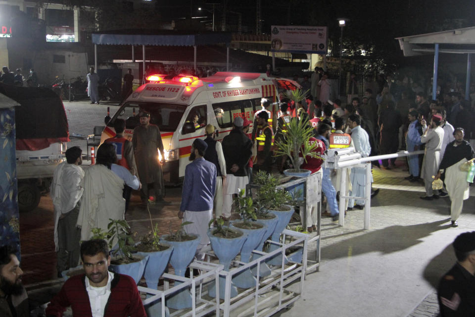 Rescue worker unload earthquake victims from an ambulance at a hospital in Saidu Sharif, a town Pakistan's Swat valley, Tuesday, March 21, 2023. A magnitude 6.5 earthquake rattled much of Pakistan and Afghanistan on Tuesday, sending panicked residents fleeing from homes and offices and frightening people even in remote villages. (AP Photo/Naveed Ali)