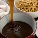 <p>This toffee fondue is for adults only! Filled with glorious bourbon and amaretto, it's sure to spice up your next party.</p><p>Get the <a href="https://www.delish.com/uk/cooking/recipes/a37702181/toffee-apple-fondue/" rel="nofollow noopener" target="_blank" data-ylk="slk:Boozy Toffee Apple Fondue;elm:context_link;itc:0;sec:content-canvas" class="link ">Boozy Toffee Apple Fondue</a> recipe.</p>