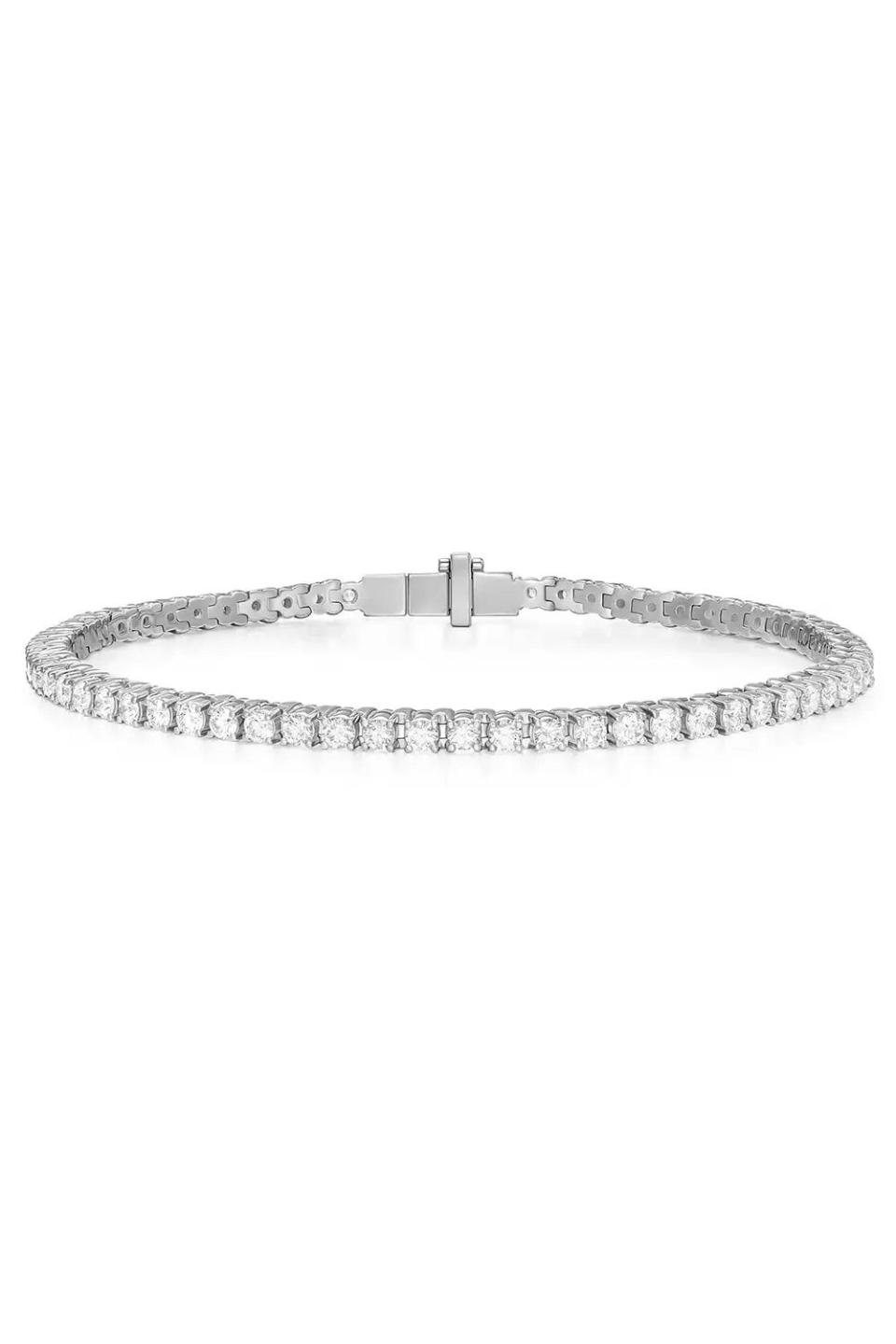 <p><a href="https://shop.harpersbazaar.com/lennox-tennis-bracelet-white-gold.html" rel="nofollow noopener" target="_blank" data-ylk="slk:Shop Now;elm:context_link;itc:0;sec:content-canvas" class="link ">Shop Now</a></p><p>Lennox Tennis Bracelet - White Gold</p><p>$12450.00</p>