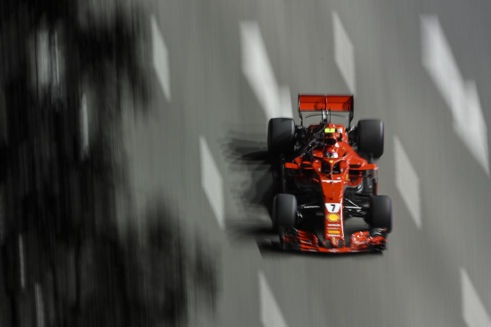 Ferrari driver Kimi Raikkonen of Finland steers his car during second practice at the Marina Bay City Circuit ahead of the Singapore Formula One Grand Prix in Singapore, Friday, Sept. 14, 2018. (AP Photo/Yong Teck Lim)