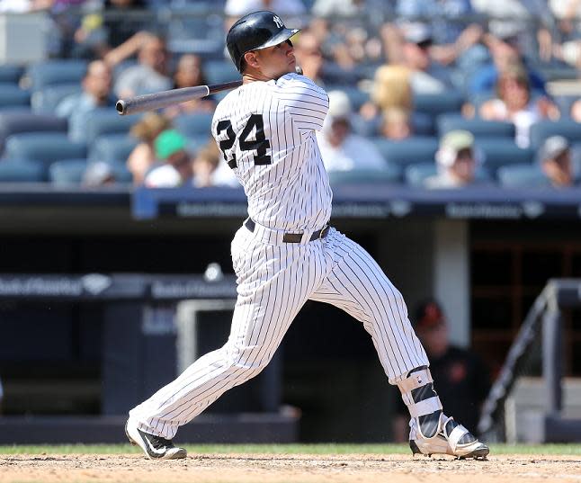 Gary Sanchez follows through on his record-setting 11th home run in his 23rd MLB game. (Getty Images)