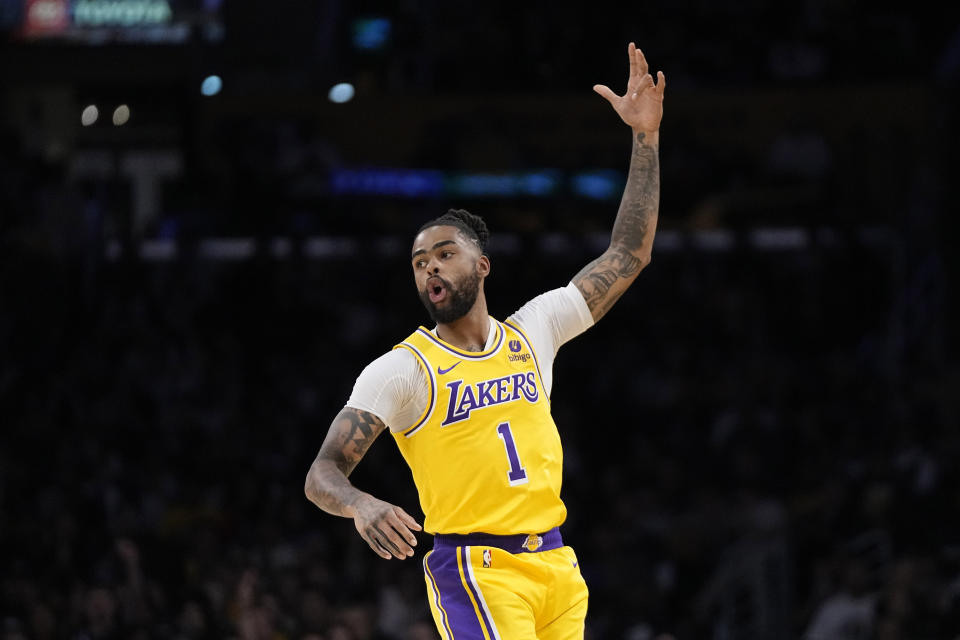 Los Angeles Lakers guard D'Angelo Russell celebrates after making a three-point shot during the first half of an NBA basketball game against the Washington Wizards Thursday, Feb. 29, 2024, in Los Angeles. (AP Photo/Mark J. Terrill)