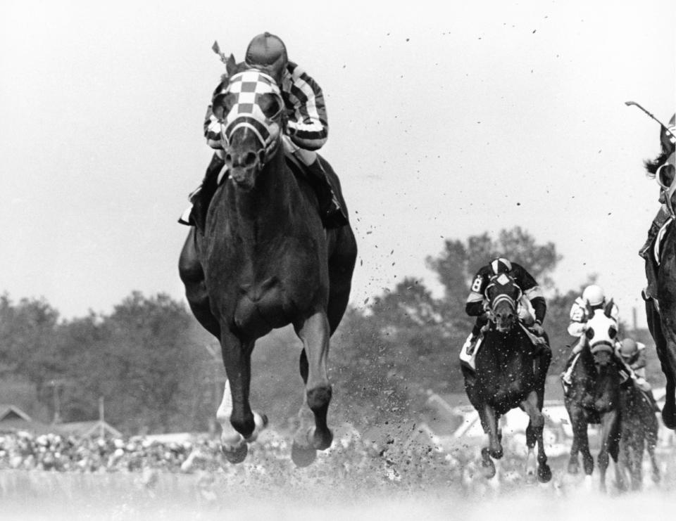 FILE - Jockey Ron Turcotte rides Secretariat during the 99th Kentucky Derby at Churchill Downs in Louisville, Ky., May 5, 1973. Secretariat was the first horse to win the Derby in under 2 minutes, in 1:59 2/5. (AP Photo/Bob Daugherty, File)
