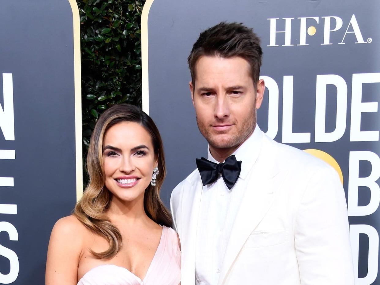 Chrishell Stause and Justin Hartley attend the 2019 Golden Globes.