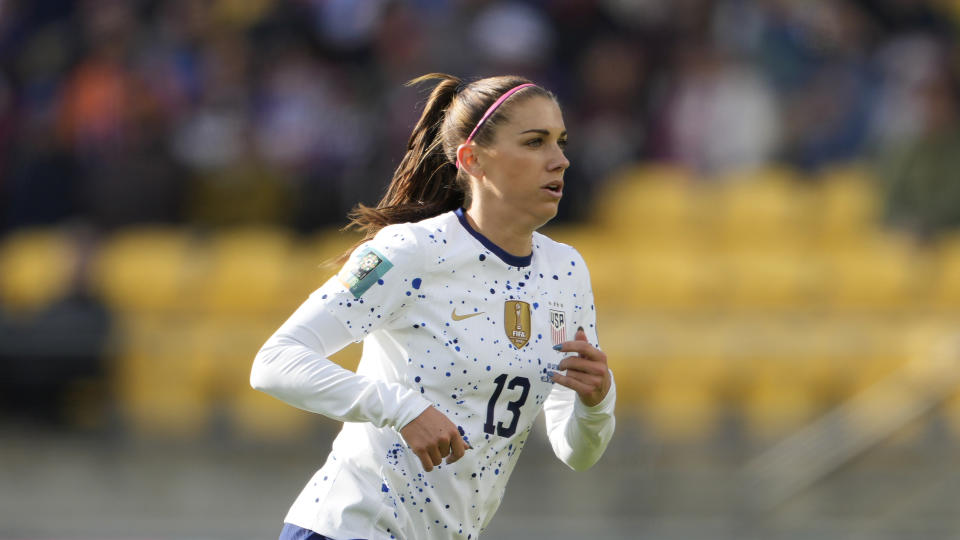 Alex Morgan and the USWNT face a high-stakes group stage finale against Portugal. (AP Photo/John Cowpland)