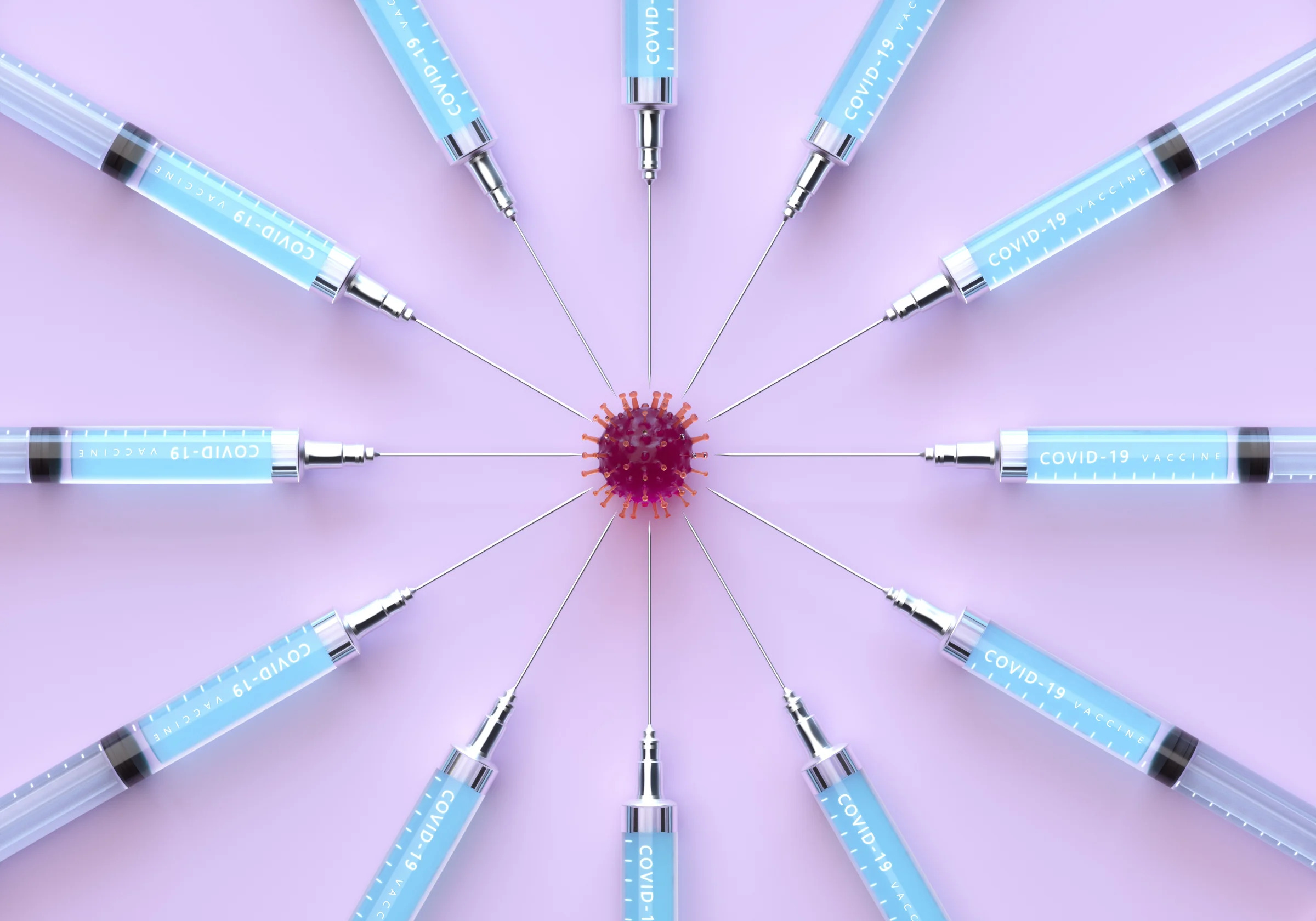 12 hypodermic needles arranged in a starburst pattern around a model of a coronavirus.