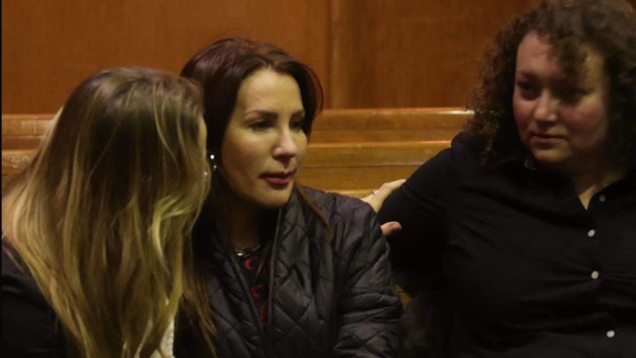 Olga Tsvyk, center, and Nadia Ford, right, react to the guilty verdict. / Credit: CBS News/Liz Caholo