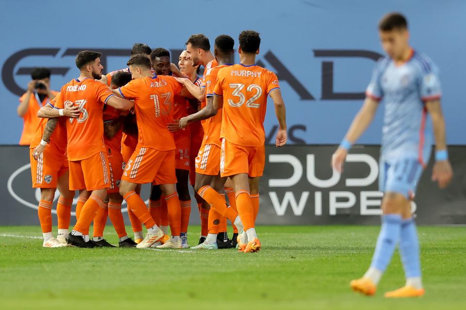 May 31, 2023; New York, New York, USA; FC Cincinnati midfielder Luciano Acosta (10) celebrates his goal against New York City FC with teammates during the first half at Yankee Stadium.