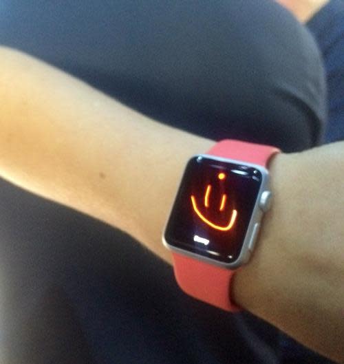 Smiley face drawn on an Apple Watch