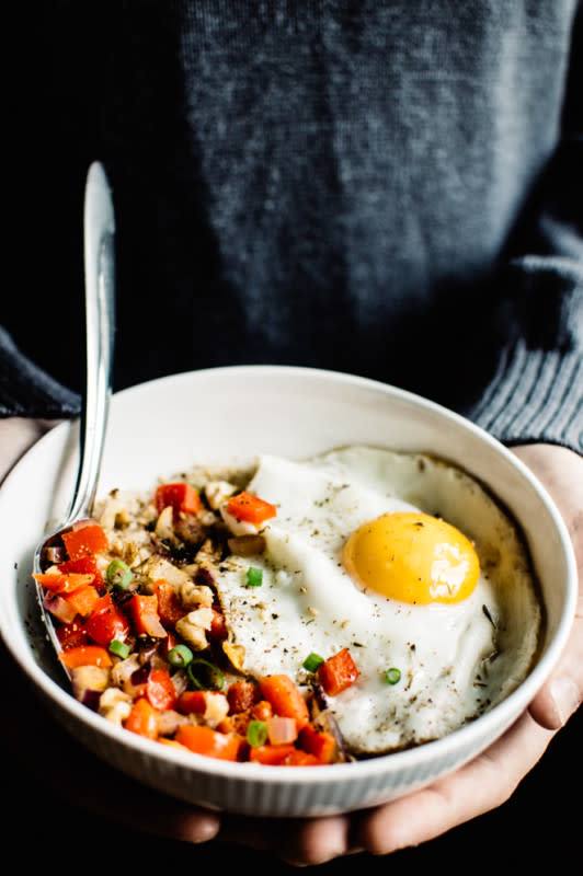 <p>Healthy Nibbles and Bits</p><p>This savory oatmeal is a great way to switch up your breakfast routine.</p><p><strong>Get the recipe: <a href="https://healthynibblesandbits.com/savory-oatmeal-cheddar-and-fried-egg/" rel="nofollow noopener" target="_blank" data-ylk="slk:Savory Oatmeal With Cheddar and Fried Egg;elm:context_link;itc:0;sec:content-canvas" class="link ">Savory Oatmeal With Cheddar and Fried Egg</a></strong></p>