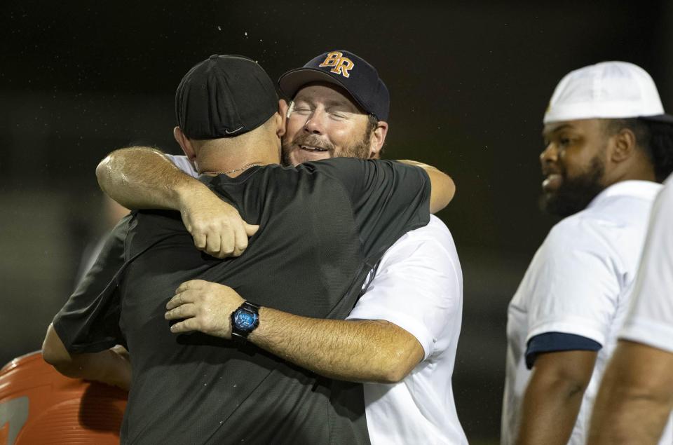 Boca Raton athletic director and former football coach Brandon Walker, pictured celebrating a win in 2019, called FHSAA's decision to start high school sports on Aug. 24, "a huge disservice for all the athletes in the southern part of the state."