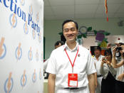 PAP's Dr Koh Poh Koon arrives at the party's Punggol East branch to watch the results.