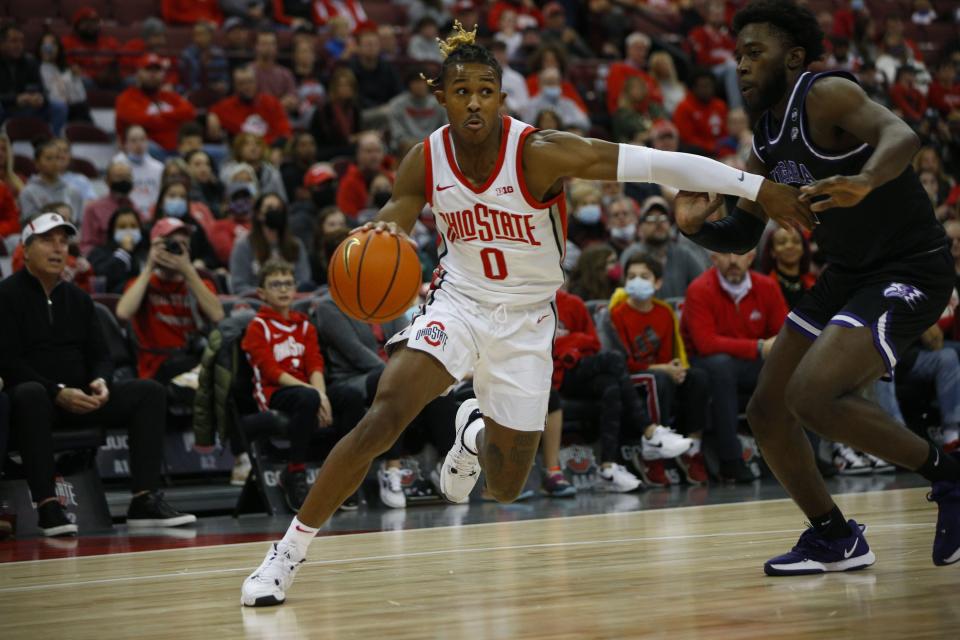 Ohio State Buckeyes guard Meechie Johnson Jr. (0) dribbles the ball during the OSU mens basketball game against Niagara in Columbus, Ohio, on Friday, Nov. 12, 2021.