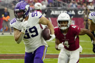 Minnesota Vikings outside linebacker Nick Vigil (59) run back an interception for a touchdown as Arizona Cardinals wide receiver Rondale Moore (4) pursues during the second half of an NFL football game, Sunday, Sept. 19, 2021, in Glendale, Ariz. (AP Photo/Rick Scuteri)