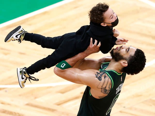 Maddie Meyer/Getty Jayson Tatum and Deuce at TD Garden