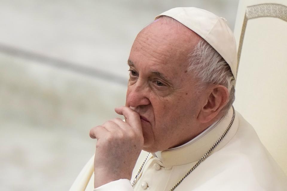 Pope Francis attends an audience with members of the "Madonna of tears" community of Treviglio, northern Italy, at the Pope Paul VI hall at the Vatican, Saturday, April 23, 2022. (AP Photo/Andrew Medichini) ORG XMIT: AJM104