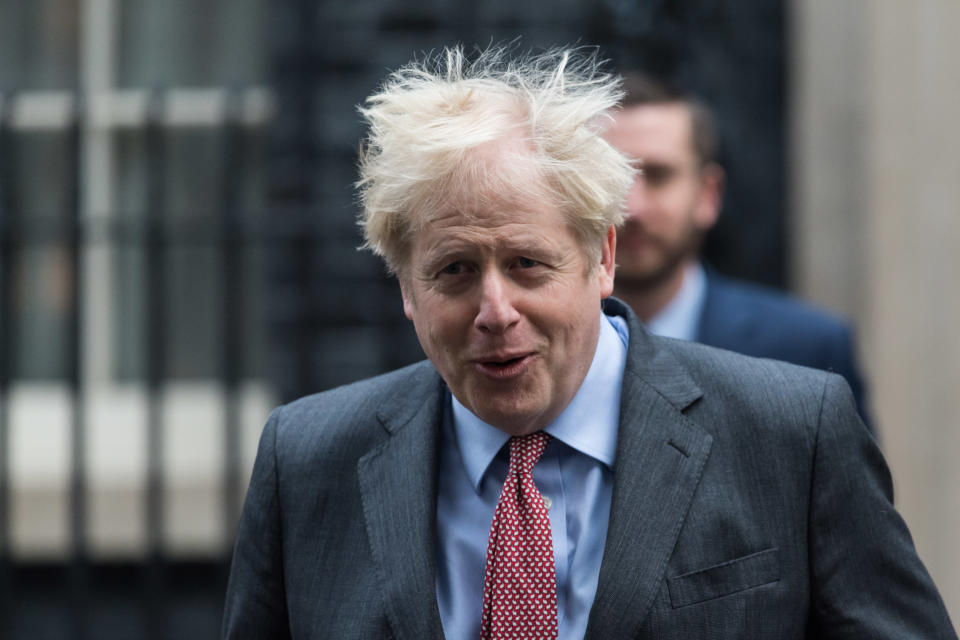 UK prime minister Boris Johnson leaves 10 Downing Street in London to attend Cabinet meeting on 8 December. Photo: WIktor Szymanowicz/NurPhoto via Getty