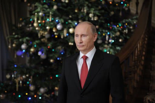 Russian Prime Minister Vladimir Putin arrives to wish the nation a happy New Year at the Novo-Ogarevo residence outside Moscow. Putin said there was nothing unusual in the mass protests against his domination of Russia, describing the turbulence as the "unavoidable price of democracy"