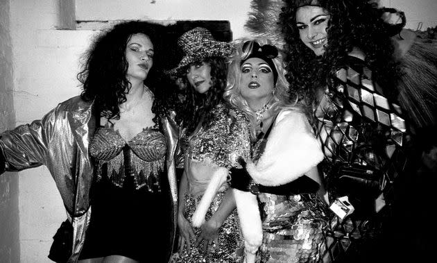 Drag queens and a friend hang out before a fashion show at Flesh in the Hacienda, Manchester 1989