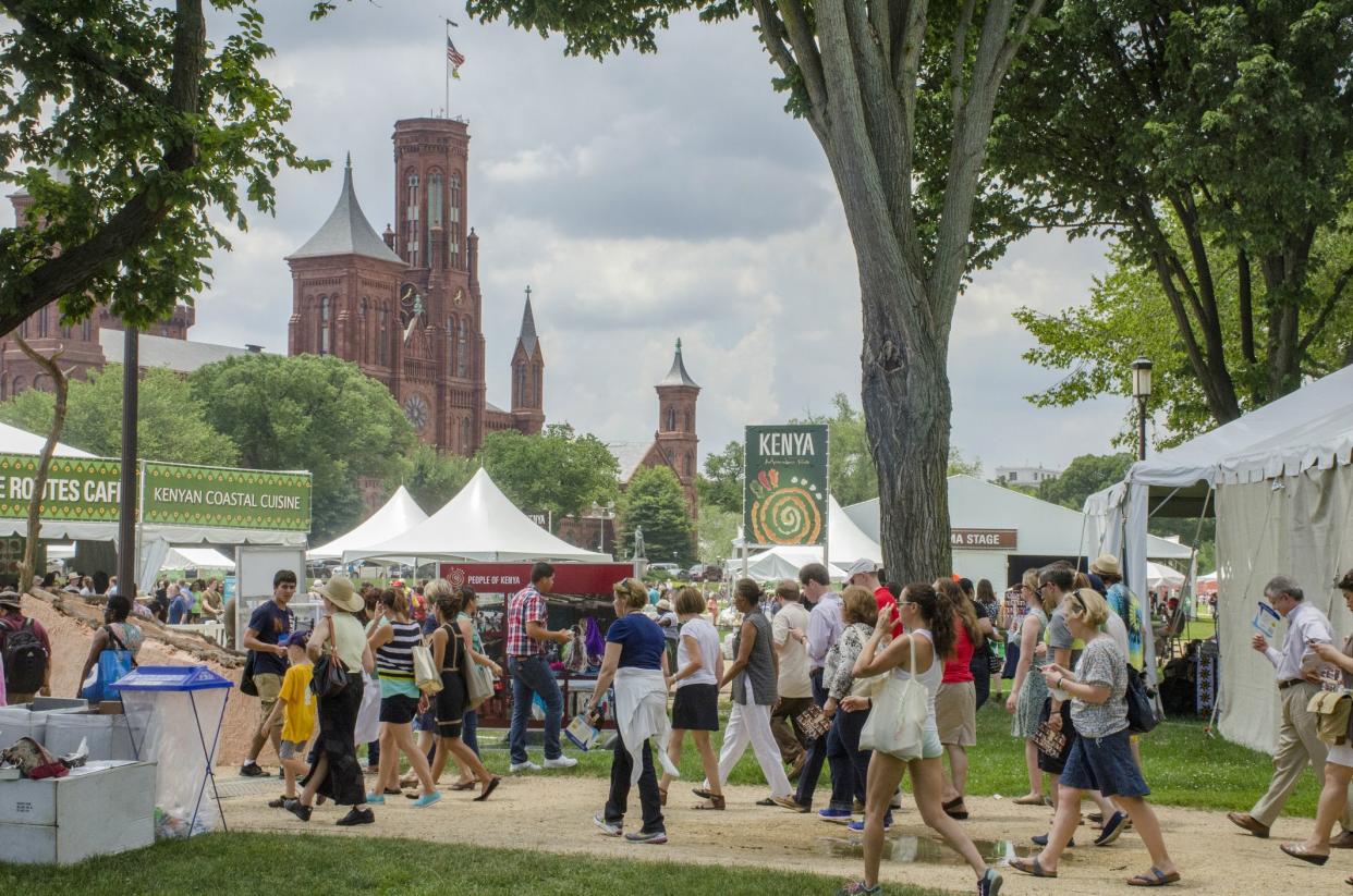 Cultures and crafts of Kenya were featured at the 2014 Smithsonian Folklife Festival, on the National Mall in Washington, DC. Smithsonian Castle is in the background.